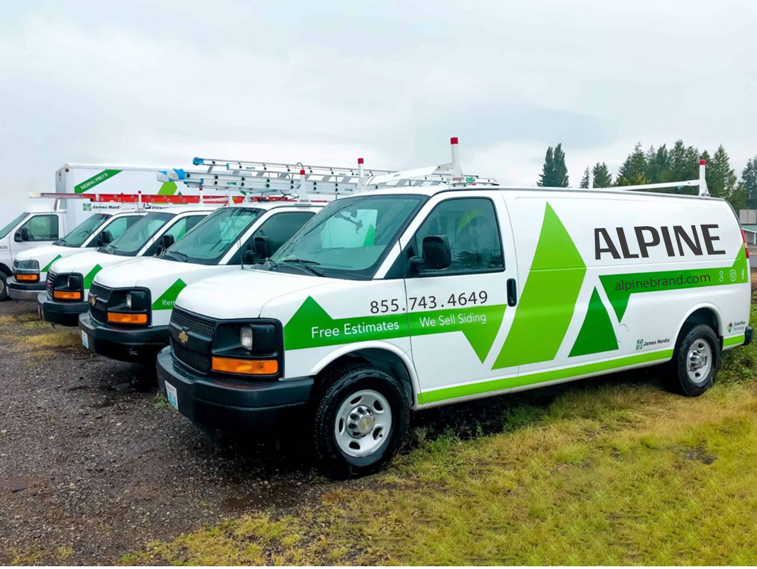 Alpine Exteriors professional van fleet with branded vehicles showcasing company presence in Tampa FL